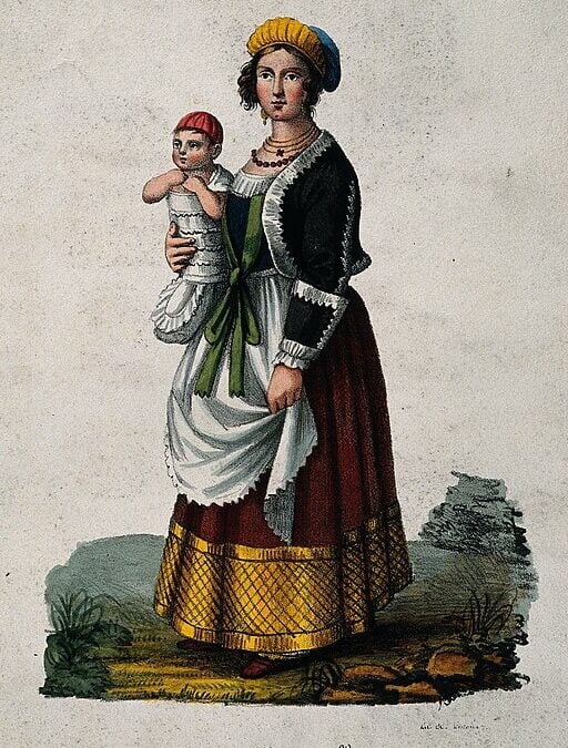 Vintage image of a woman dressed in Neapolitan costume holding a baby. Coloured lithograph by A.C. Ledoux